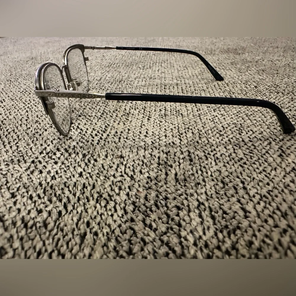 Calvin Klein youth eyeglasses and case.